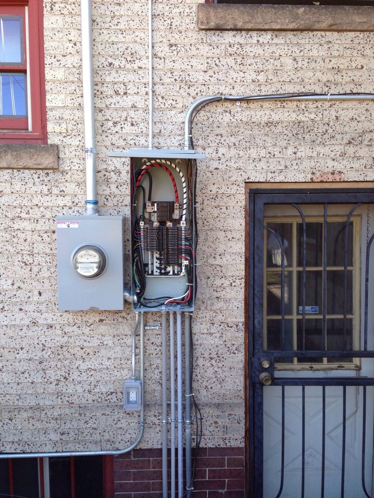 Exterior electrical panel and disconnect installation by Aspen Electric Company